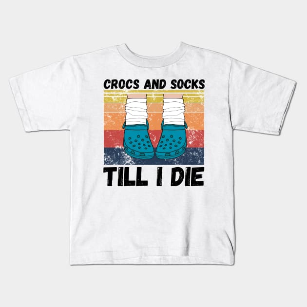 Crocs and socks till I die Kids T-Shirt by JustBeSatisfied